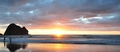 Coucher de soleil sur Piha Beach